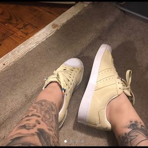 Pastel yellow adidas superstar Vulc